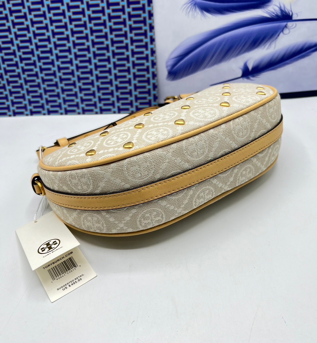 TORY BURCH T Monogram Crescent Bag NEW IVORY MULTI กระเป๋าทรงพระจันทร์เสี้ยวแต่งหัวใจสีทองสวยหรู น่ารักรุ่นใหม่ล่าสุด เกรดท็อปออริ เทียบแท้ 1:1 เกรดดีสุด