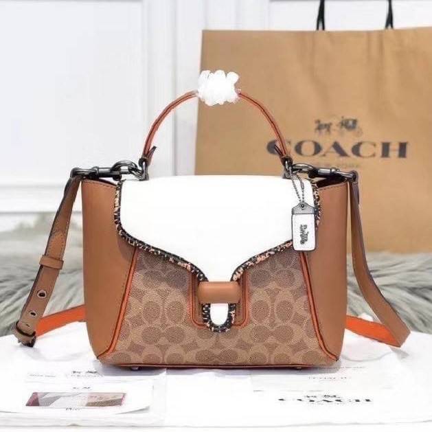 COACH COURIER CARRYALL 23 IN COLORBLOCK SIGNATURE CANVAS พร้อมส่ง 7 แบบ พร้อมส่ง ลุคดูไฮสุดๆค่ะ! กระเป๋าสะพายหนังหรูหราและคลาสสิค หนังแท้ชั้นดีที่สุด น้ำหนักเบา หนังสวยมากก สัมผัสแล้วหลงรักแน่นอนจ้าา😘