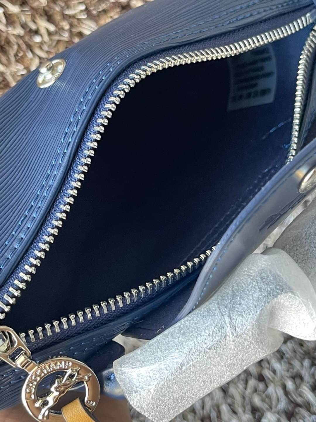 LONGCHAMP LE PLIAGE CITY POUCH WITH HANDLE Taupe - Canvas (ไม่มีสายยาว) กระเป๋าเครื่องสำอางแบบมีซิปพร้อมหูหิ้วใบนี้เหมาะสำหรับการจัดระเบียบกระเป๋าของคุณ