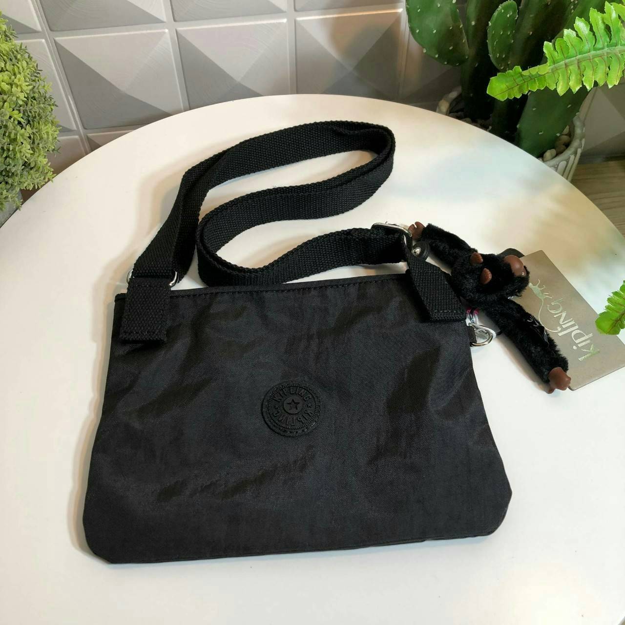 Kipling MAY Small 2-in-1 Pouch and Crossbody กระเป๋าสะพายหรือคาดเอว ขนาดมินิรุ่น Limited ทรงน่ารัก น้ำหนักเบา ใช้ได้ทั้งสองด้าน ด้านหน้ามีสกรีน mickey mouse ด้านหลังประดับโลโก้ มาพร้อมพวงกุญแจแบรนด์ เปิดปิดด้วยซิปสะดวกใช้ หัวซิปแบรนด์ มีหนึ่งช่องซิป และสา