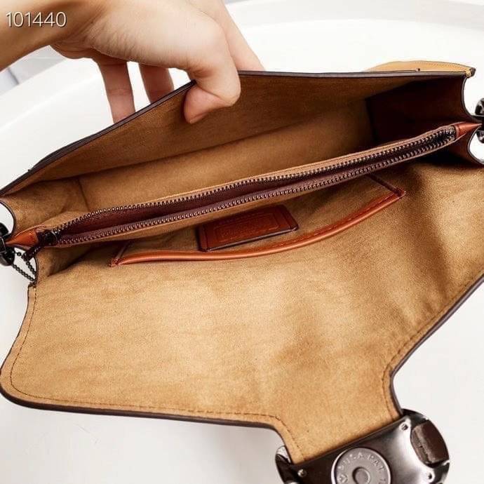 Coach Tabby Shoulder Bag 26 Polished pebble leather, suede and refined calf leather Inside zip and multifunction pockets