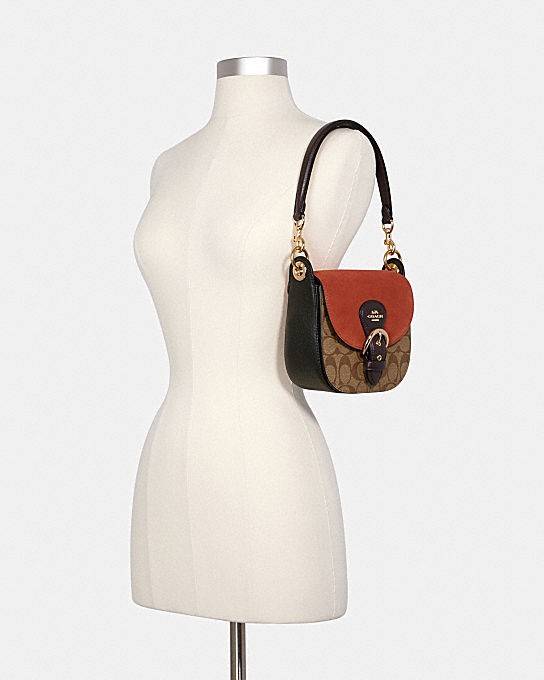 COACH C5691 KLEO SHOULDER BAG 17 IN SIGNATURE CANVAS ใหม่สุด!! สวยหรูไม่มีใครเกิน!! กระเป๋าสะพายสวยครบสูตร แค่เห็นก็ปิ๊ง!!วัสดุหนังแคนวาสสลับหนังแท้ ลงตัวที่หนึ่ง เปิด-ปิดด้วยสายคาดแม่เหล็กในตัว โดดเด่นมากๆ ภายในเป็นช่องโล่ง มีสายสะพายมาให้ถึง 2 แบบ สายคล