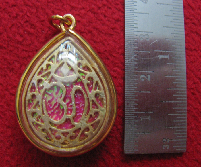 สินค้าหมดค่ะ จี้พระพิฆเนศปางลีลาพระนฤตยะคณปติ(ศิละปิน ดารา นักแสดง ผู้ที่พบปะผู้คน)พื้นสีม่วงล้อมเพชรเลี่ยมทองไมครอนพร้อมใบคาถาค่ะ