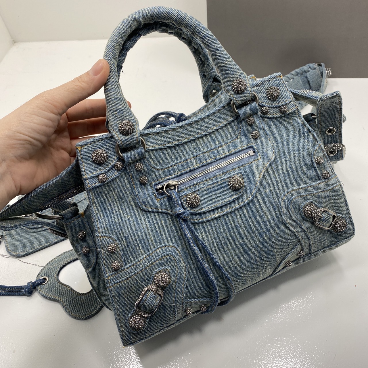 Balenciaga NEO CAGOLE XS HANDBAG DENIM IN BLUE aged-silver hardware with rhinestones กระเป๋าสะพายเดนิม สวยเท่ ประดับหมุดเพชร เกรดออริ 1:1 สลับแท้ ใช้งานต่างประเทศได้
