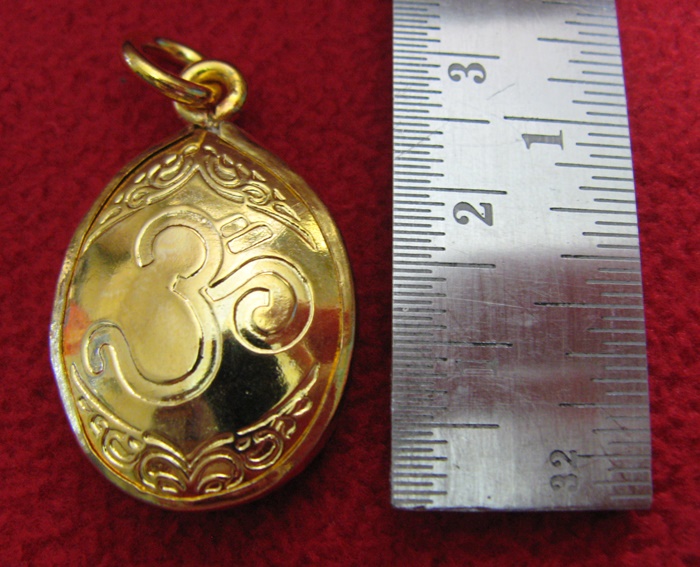 สินค้าหมดค่ะ ล็อกเก็ตพระพิฆเนศปางหริทราคณปติ(ปางรวยเสน่ห์-รวยทรัพย์)พื้นสีเหลืองหลังโอมเลี่ยมทองไมครอนพร้อมใบคาถาค่ะ