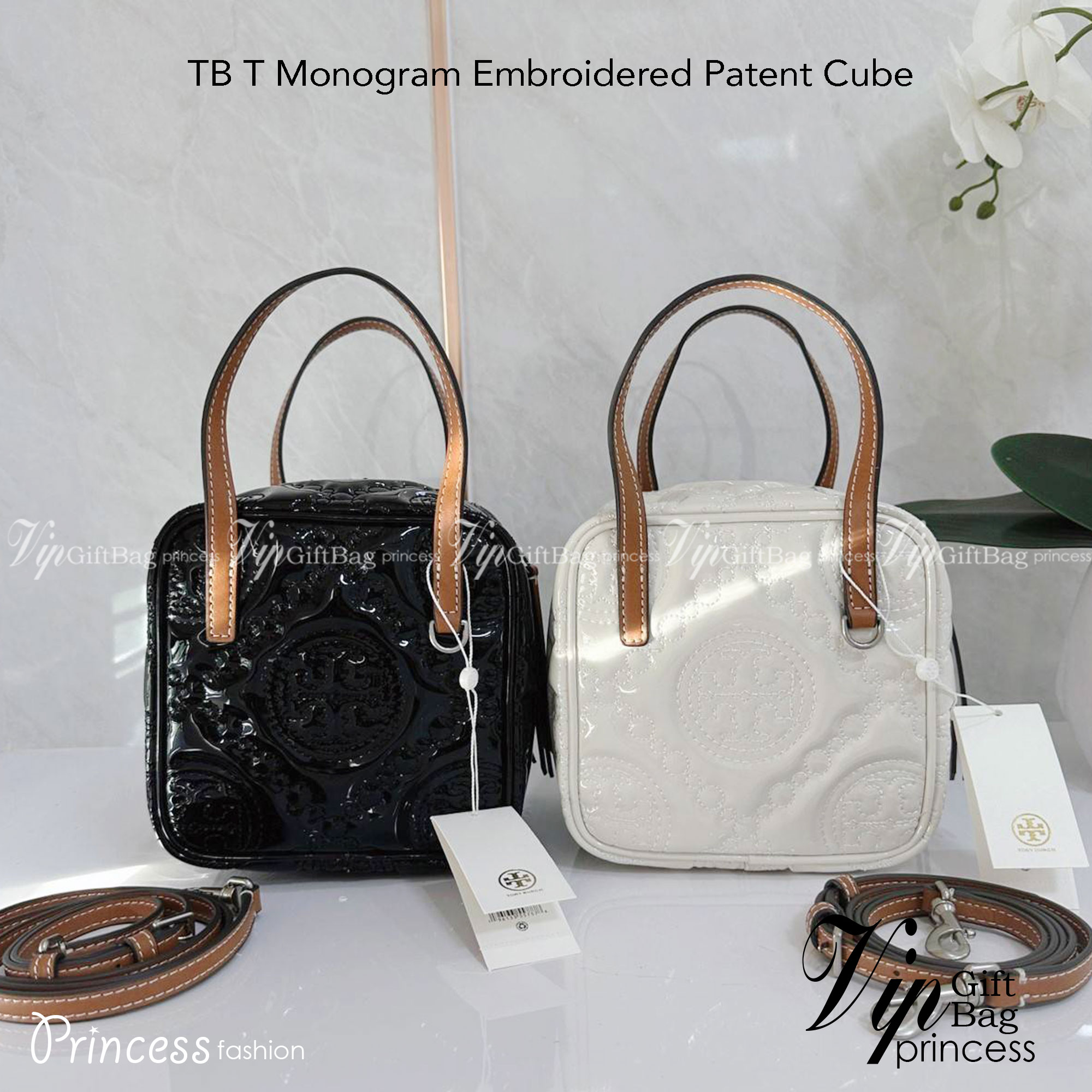 Tory Burch T Monogram Embroidered Patent Cube คอลเลคชั่นใหม่ รุ่นลิมิเต็ดรูปทรงใหม่ T Monogram สุดcube วัสดุหนังแท้ เปิด-ปิดด้วยซิป ภายในกว้าง มีช่องแยก 1 ช่อง สามารถใส่โทรศัพท์มือถือได้ทุกรุ่น สามารถถือหิ้วหรือสะพายได้ สายสามารถถอดและปรับระดับได้คะ