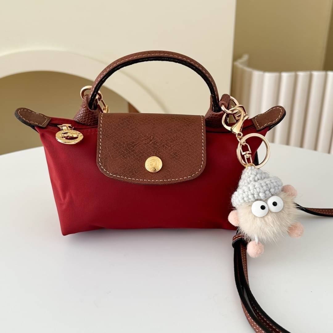 LONGCHAMP LE PLIAGE ORIGINAL Pouch with handle กระเป๋าใบเล็กขนาดกระทัดเหมาะกับใส่ของจำเป็นจุกจิก กันน้ำได้ พร้อมส่ง