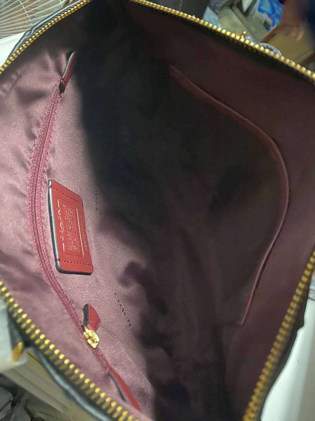 Coach Elise Satchel Polished pebble leather Inside zip and snap pockets Zip-top closure, fabric lining Handles