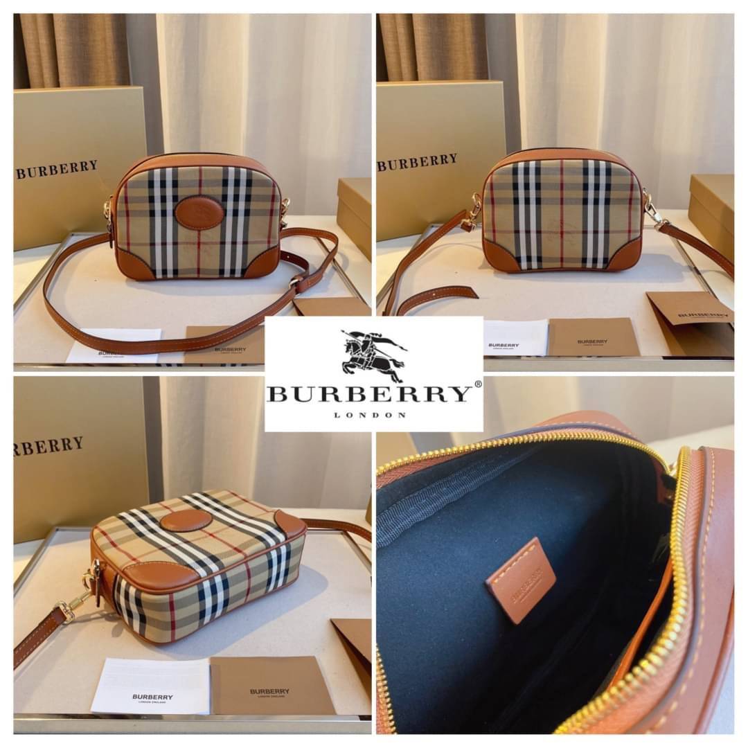 BURBERRY CROSSBODY VINTAGE BAG กระเป๋าสะพายทรง camera ซิปบน ลายซิกเนเจอร์แบรนด์ มาพร้อมสายสะพายยาวครอสบอดี้ งานสวยเป๊ะปั๊มทุกจุด สวยอยู่ทรง เปิดปิดด้วยซิปยาว ภายในมีช่องแบ่งเป็นสัดส่วน สามารถใส่มือถือ iphone เงิน ของจุกจิกได้ สายสะพายหนังยาวปรับระดับได้ อ