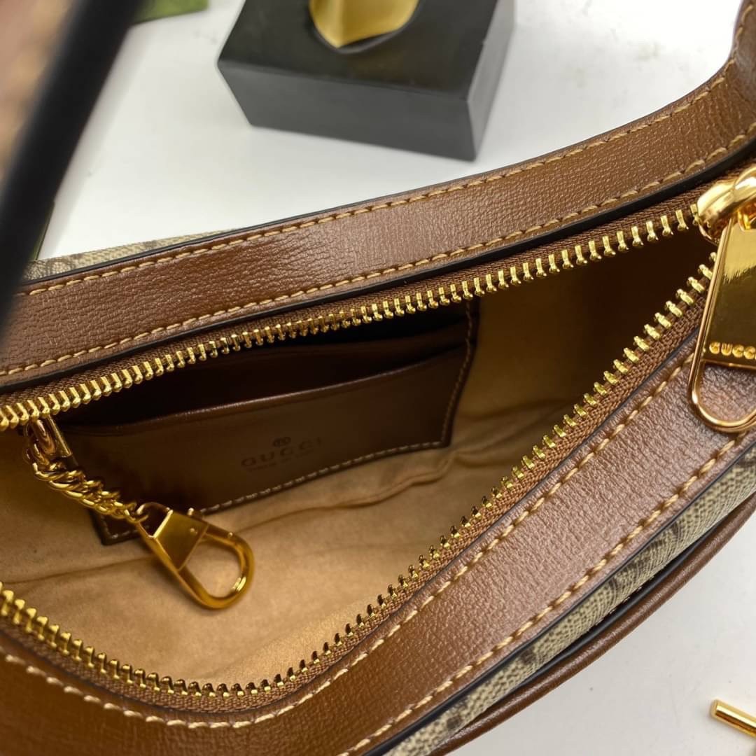 GUCCI GG half-moon-shaped mini bag เกรดออริจินอล ภาพสินค้าถ่ายจากงานขายจริง ใช้งานต่างประเทศได้ รูปทรงพระจันทร์เสี้ยวบนผ้าแคนวาส GG Supreme