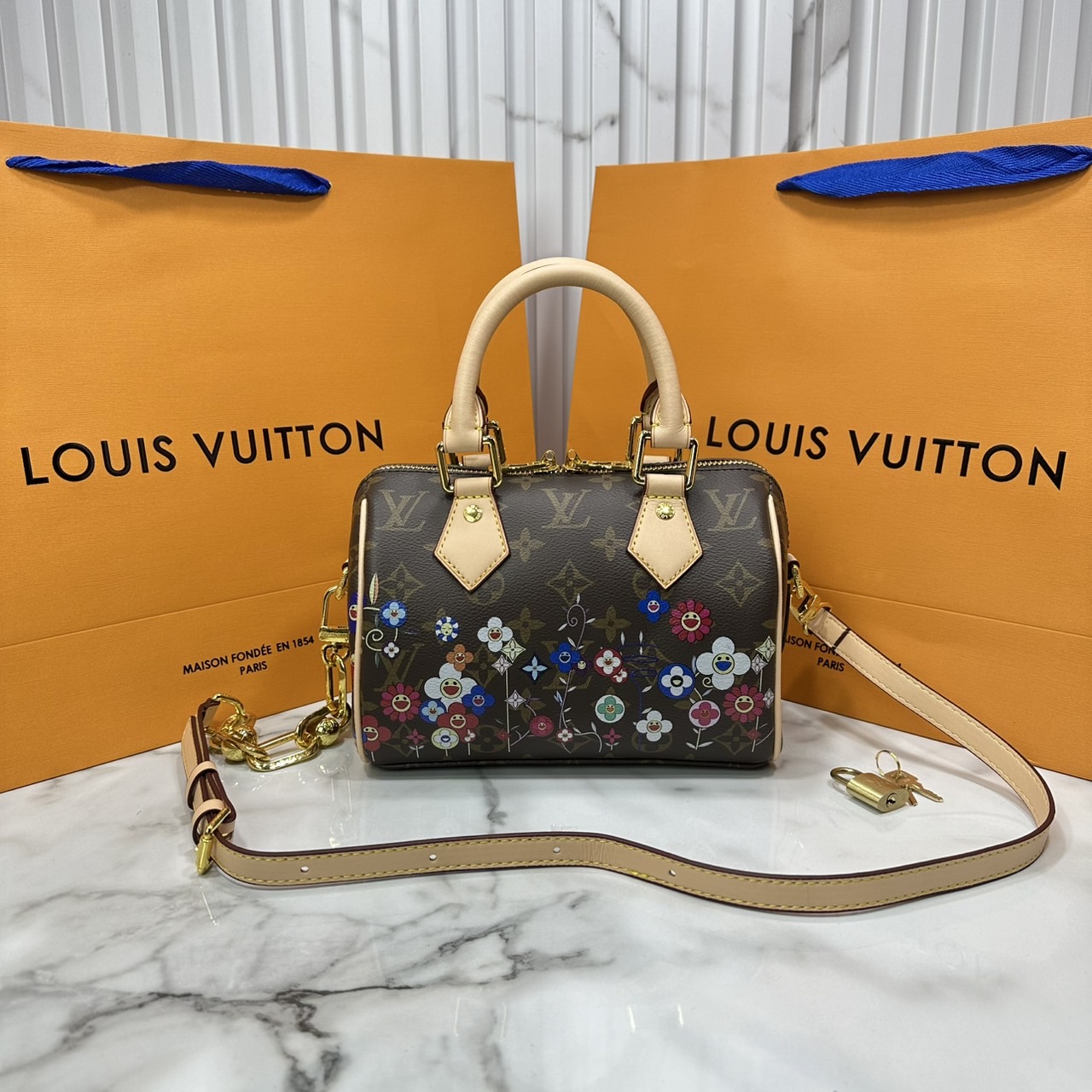LV x TM Speedy Bandoulière 20 bag Monogram Flower กระเป๋าทรงหมอนคอลเลกชันสุดพิเศษ สวยคลาสสิกมีชีวิตชีวา สีสันสดใสสไตล์ superflat สุดไอคอนิกของ Takashi Murakami ด้วยโมโนแกรมดอกไม้หลากสี