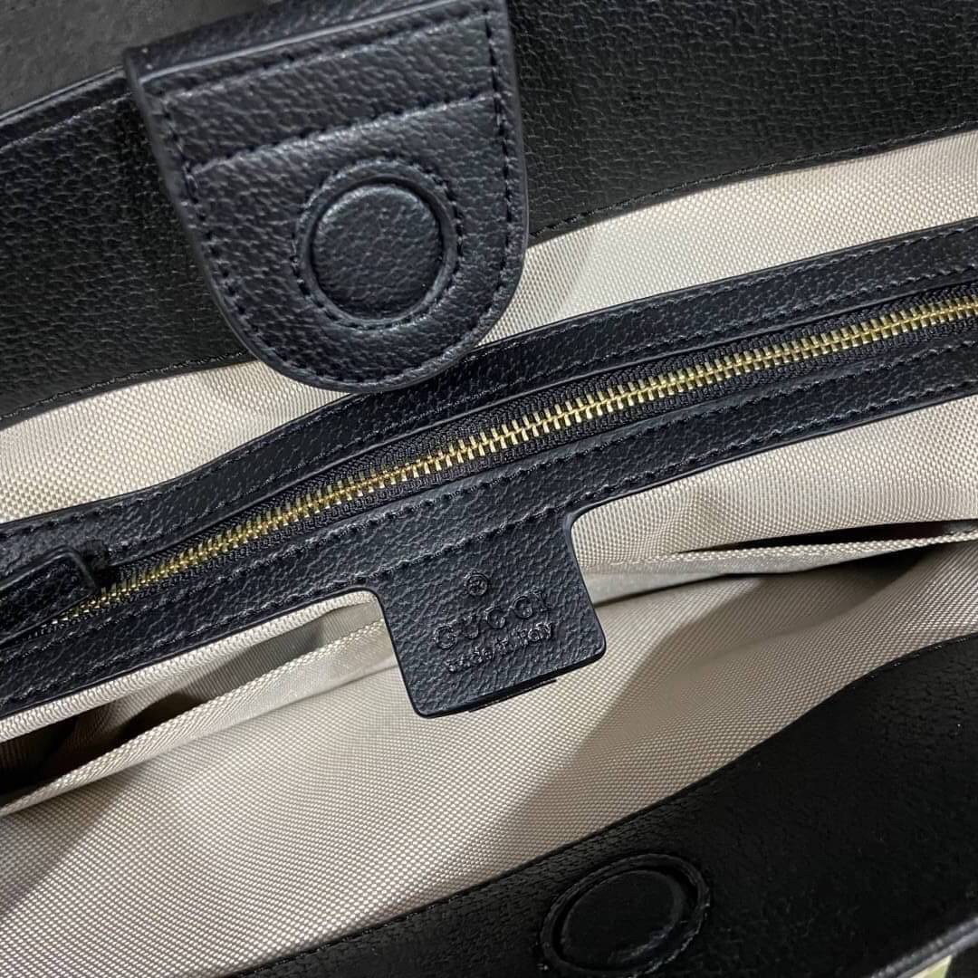 GUCCI Ophidia medium tote with Web / GUCCI Shopping Bag เกรดออริจินอล กระเป๋าสะพายทางโท้ทใบใหญ่ ดีไซส์ร่วมสมัยลวดลาย GG โมโนแกรมที่นำเสนอพร้อมความรู้สึกร่วมสมัยผ่านการใช้ผ้าเดนิมสีดำและสีขาวงาช้าง ภาพถ่ายจากงานขายจริง ใช้งานต่างประเทศได้