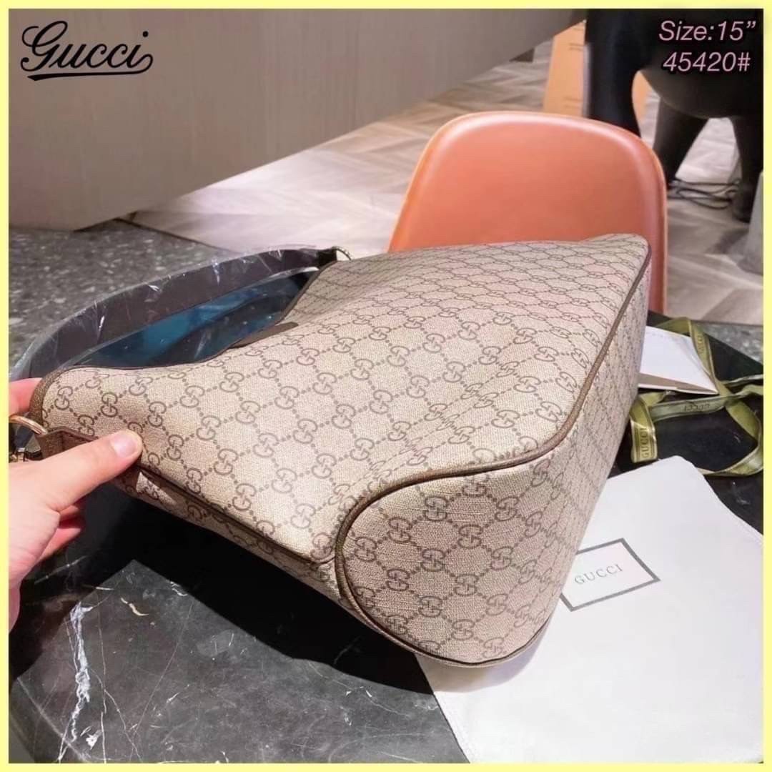 GUCCI Tote Bag / GG Ophidia Tote Bag กระเป๋าสะพายโท้ทใบใหญ่ คลาสสิคโมโนแกรมสุดหรู วัสดุแคนวาสตัดขอบหนัง ภายในเป็นช่องโล่งกว้าง จุของได้เยอะ หยิบจับสะดวก ใช้งานสะดวกสามารถสะพายได้ทุกวัน