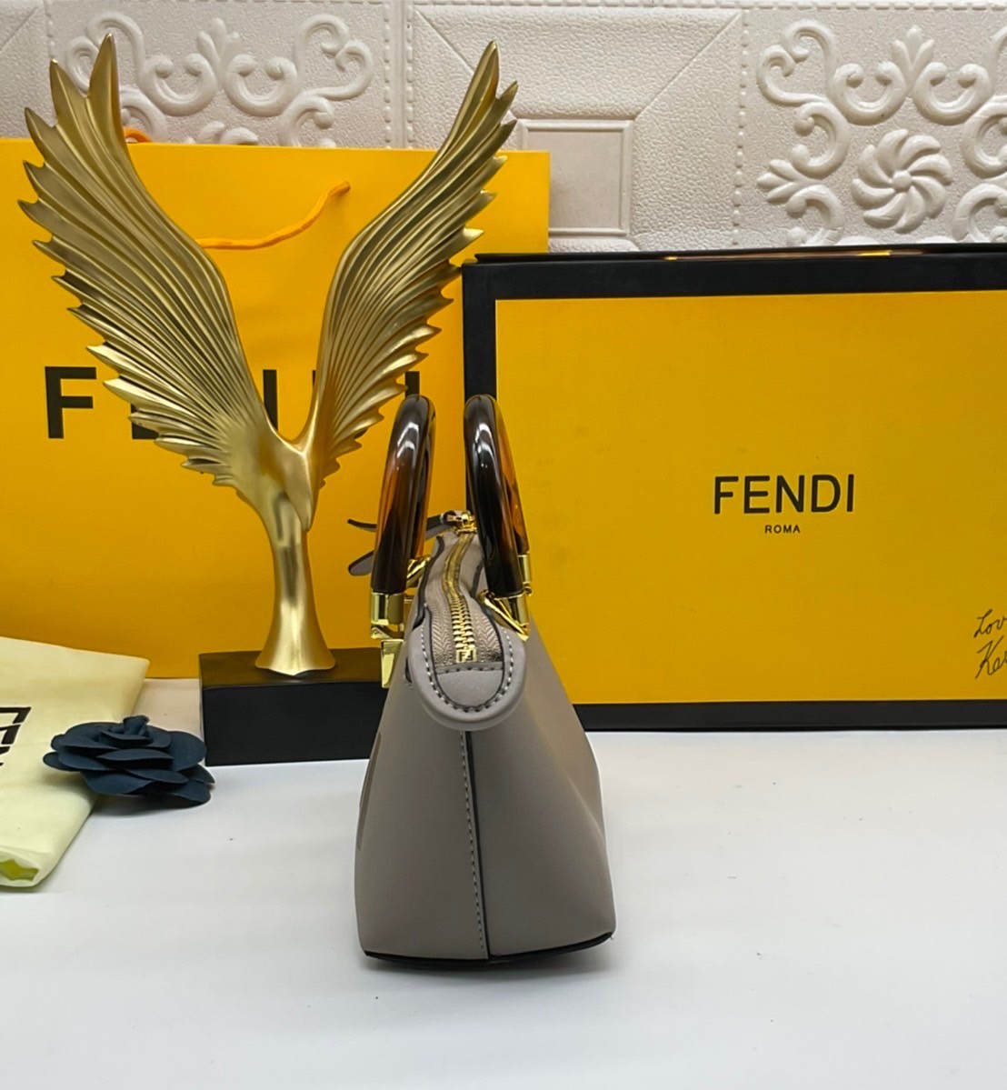 FENDI By The Way Mini Bag พร้อมส่งที่ไทย ภาพถ่ายจากงานขายจริง Iconic mini By The Way Boston bag made FENDI ROMA lettering and rigid tortoiseshell-effect plexiglass handles.