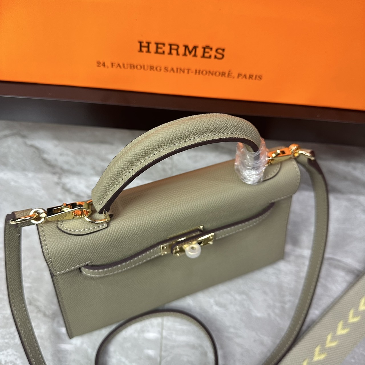 ORI หนังแท้ | Hermes Mini Kelly Pochette 20cm จิ๋วแต่แจ๋ว ราคาพุ่งยิ่งกว่าทอง พร้อมสายสปอร์ต กระเป๋าสะพายที่สุดแห่งหรูหราลัคชู นิยามของความสง่างามเหนือกาลเวลา