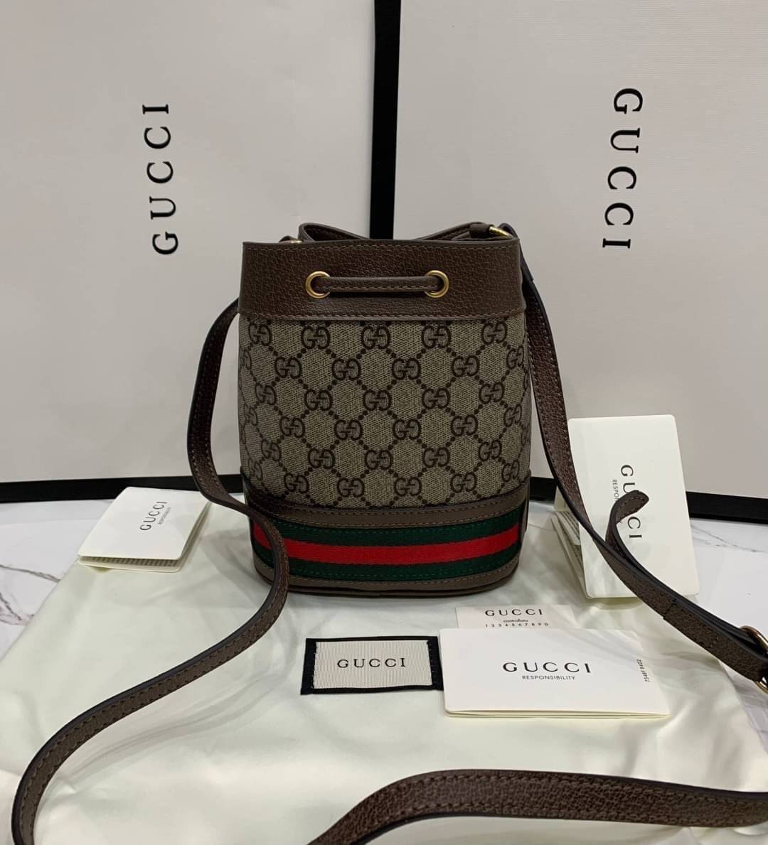 พรีเมี่ยมกิ๊ฟแท้ 100% 】GUCCI Ophidia mini GG bucket bag งานหนังแท้ รุ่นยอดนิยมใบขนาดน่ารักน่าใช้ กระเป๋าทรงบัคเก็ต สีผู้ดี๊ผู้ดี ตัวกระเป๋าดีไซน์คลาสสิค วัสดุหนังแท้ สวยคมทุกมุม ควรมีเลยค่าาา