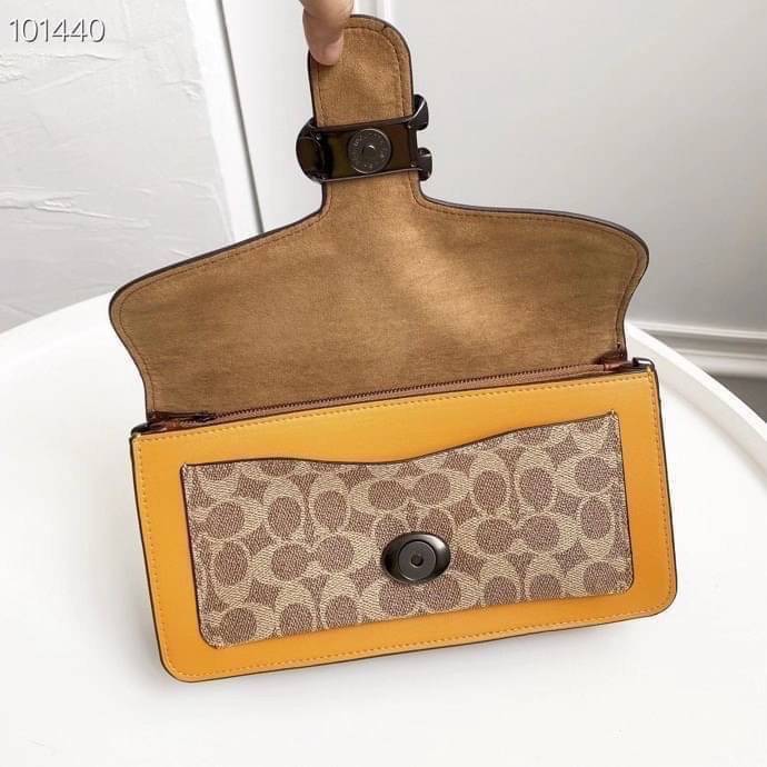 Coach Tabby Shoulder Bag 26 Polished pebble leather, suede and refined calf leather Inside zip and multifunction pockets