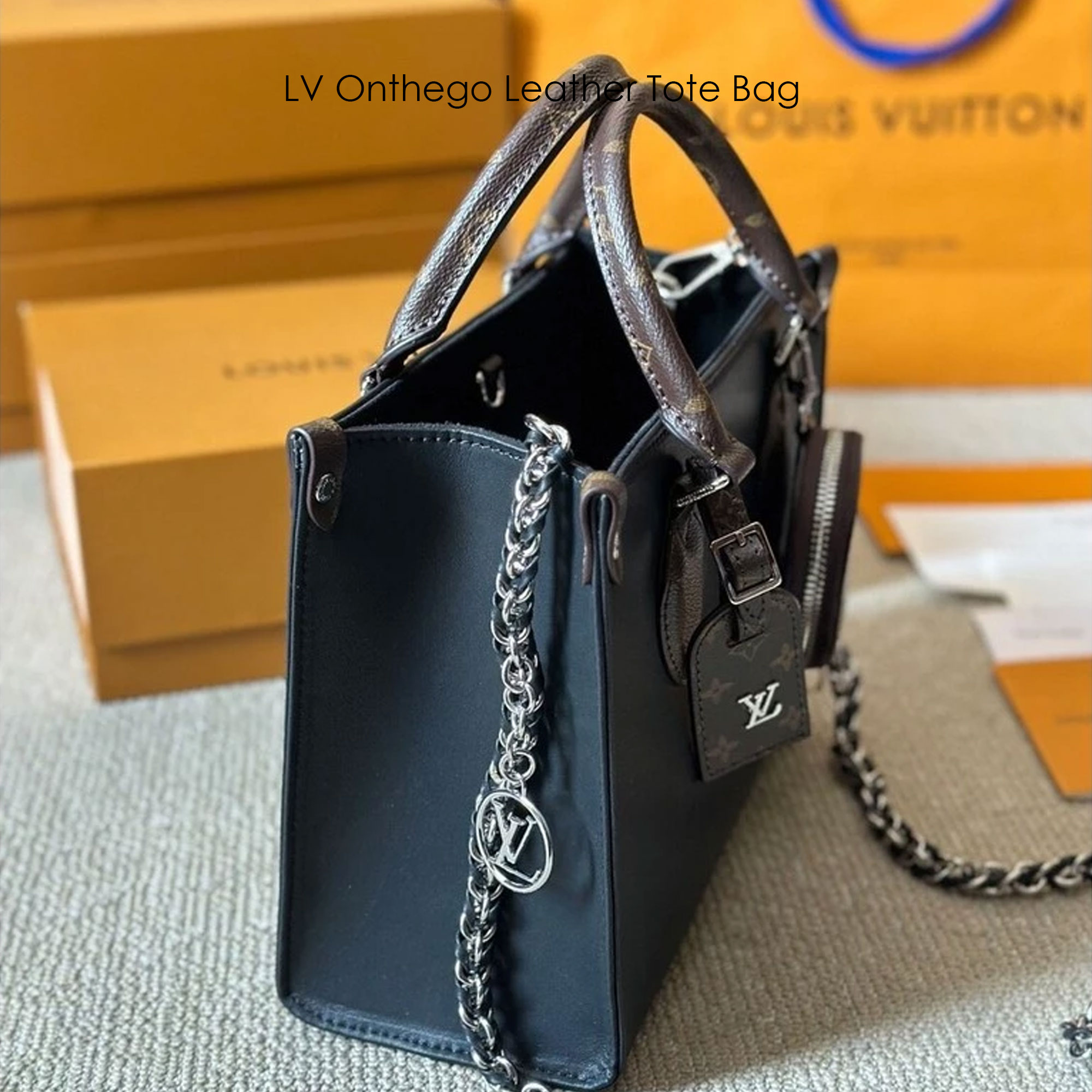 LV Onthego Leather Tote Bag กระเป๋าทรงโท้ทดีไซน์ใหม่ สีดำสุดคลาสสิก พร้อมสายสะพายโซ่ร้อยหนังสีดำเข้าเซ็ทและใบลูกลายโมโนแกรมตัดสีกันได้อย่างลงตัว ตอบโจทย์ได้ทุกลุค ทุกสไตล์