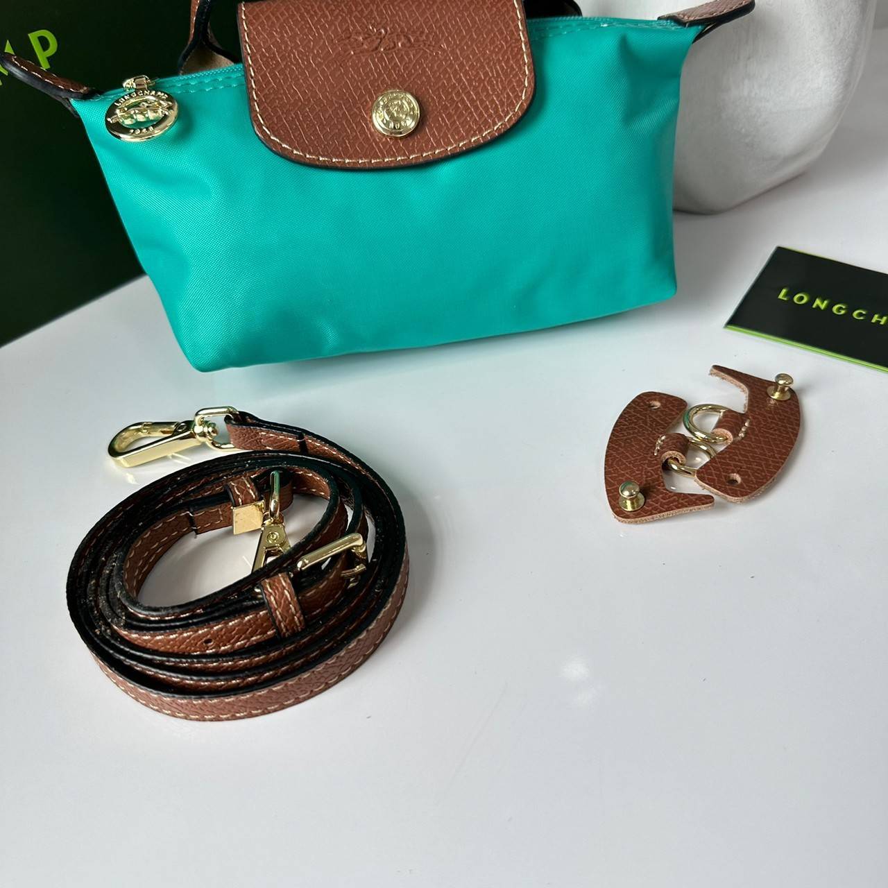 LONGCHAMP LE PLIAGE ORIGINAL Pouch with handle กระเป๋าใบเล็กขนาดกระทัดเหมาะกับใส่ของจำเป็นจุกจิก กันน้ำได้ พร้อมส่ง