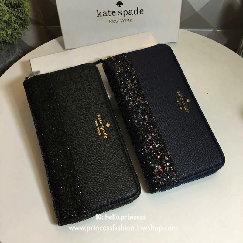KATE SPADE LONG WALLET กระเป๋าสตางค์ใบยาวรุ่นใหม่ล่าสุดหนัง Saffiano สไตล์ PRADA สวยน่าใช้ตัวกระเป๋าตกแต่งด้วยกลิทเตอร์ ภายในมีช่องซิป1ช่อง และช่องใส่บัตรหลายช่อง ใส่เหรียญ บัตรได้เยอะ ตัวจริงสวยน่าใช้มากค่ะ