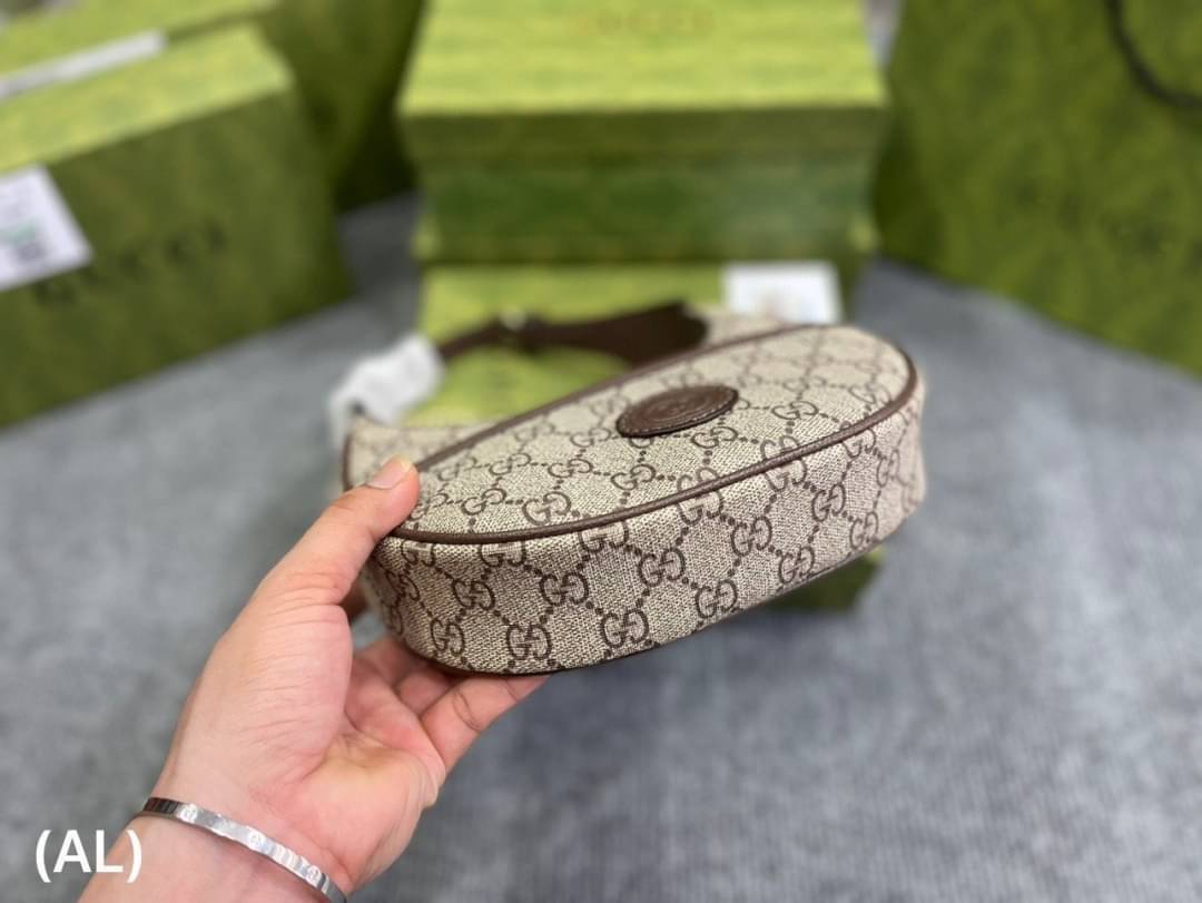 GUCCI half-moon Ophidia mini shoulder bag กระเป๋าสะพายไหล่รูปทรงพระจันทร์เสี้ยว Canvas GG Supreme กระเป๋าขนาดมินิให้ความรู้สึกย้อนยุคอันโดดเด่น สไตส์วินเทจ