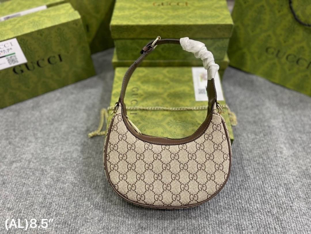 GUCCI half-moon Ophidia mini shoulder bag กระเป๋าสะพายไหล่รูปทรงพระจันทร์เสี้ยว Canvas GG Supreme กระเป๋าขนาดมินิให้ความรู้สึกย้อนยุคอันโดดเด่น สไตส์วินเทจ