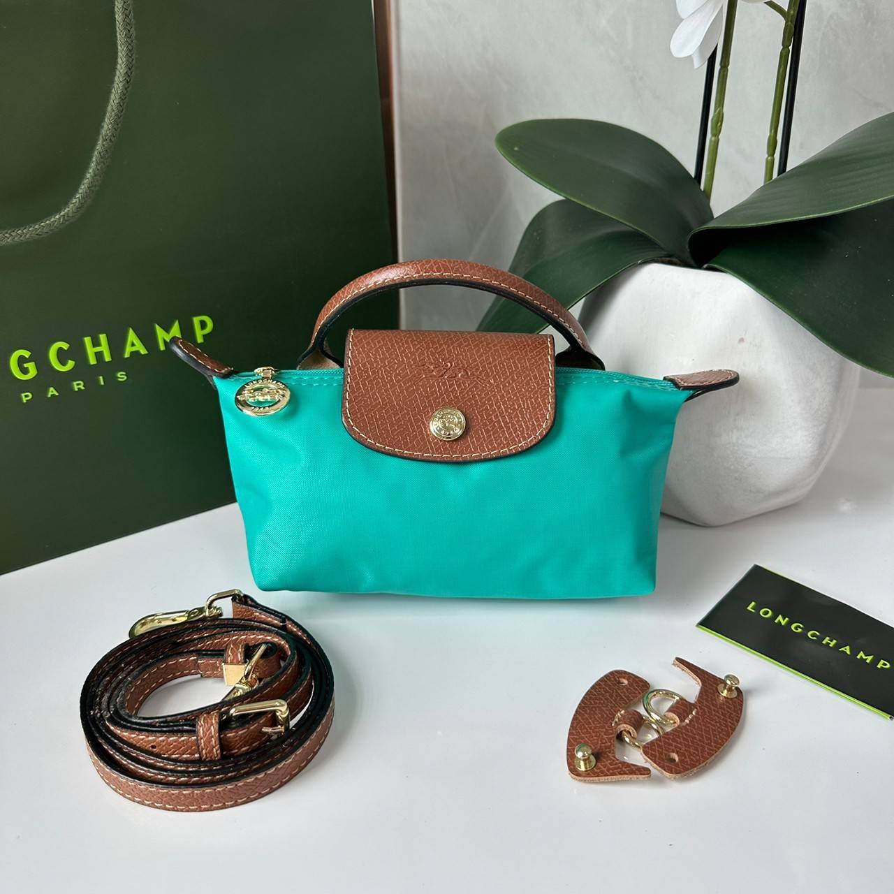 LONGCHAMP LE PLIAGE ORIGINAL Pouch with handle กระเป๋าใบเล็กขนาดกระทัดเหมาะกับใส่ของจำเป็นจุกจิก กันน้ำได้ พร้อมส่ง