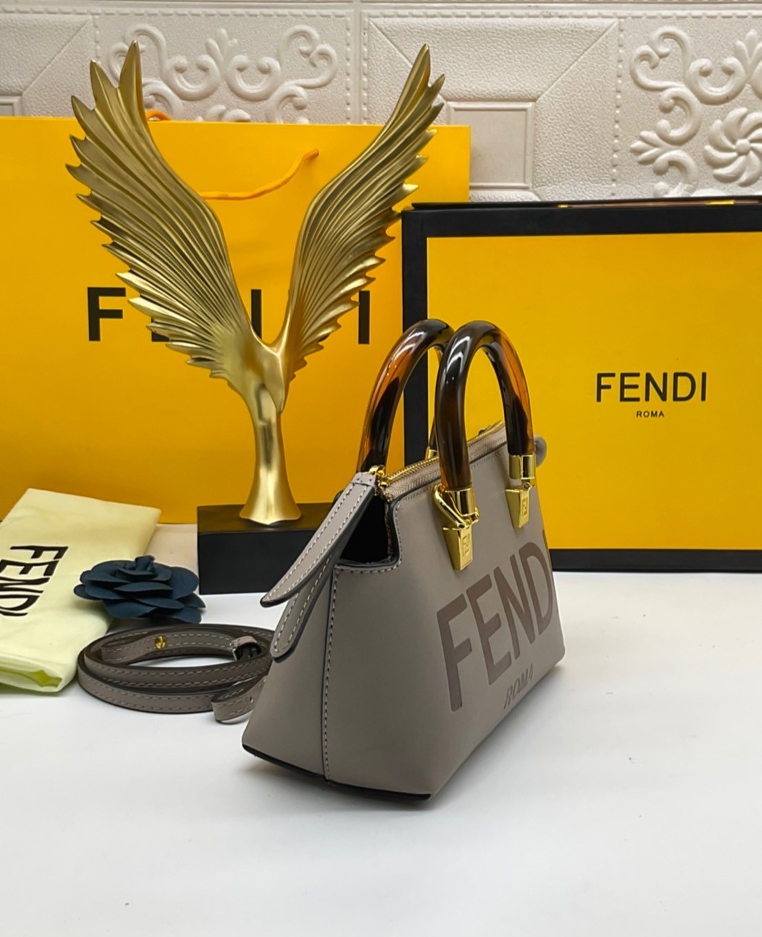FENDI By The Way Mini Bag พร้อมส่งที่ไทย ภาพถ่ายจากงานขายจริง Iconic mini By The Way Boston bag made FENDI ROMA lettering and rigid tortoiseshell-effect plexiglass handles.