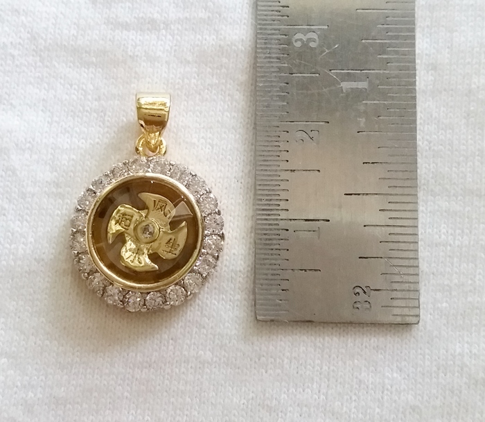 สินค้าหมดค่ะ จี้กังหันสีทองล้อมเพชรเสริมดวงค่ะ