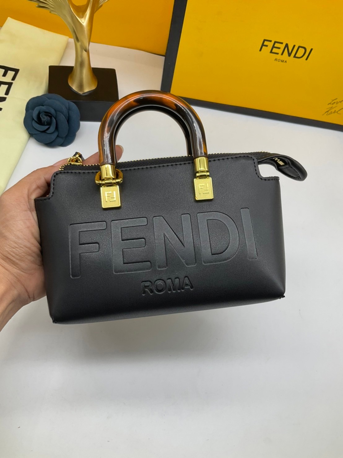 FENDI By The Way Mini Bag พร้อมส่งที่ไทย ภาพถ่ายจากงานขายจริง Iconic mini By The Way Boston bag made FENDI ROMA lettering and rigid tortoiseshell-effect plexiglass handles.
