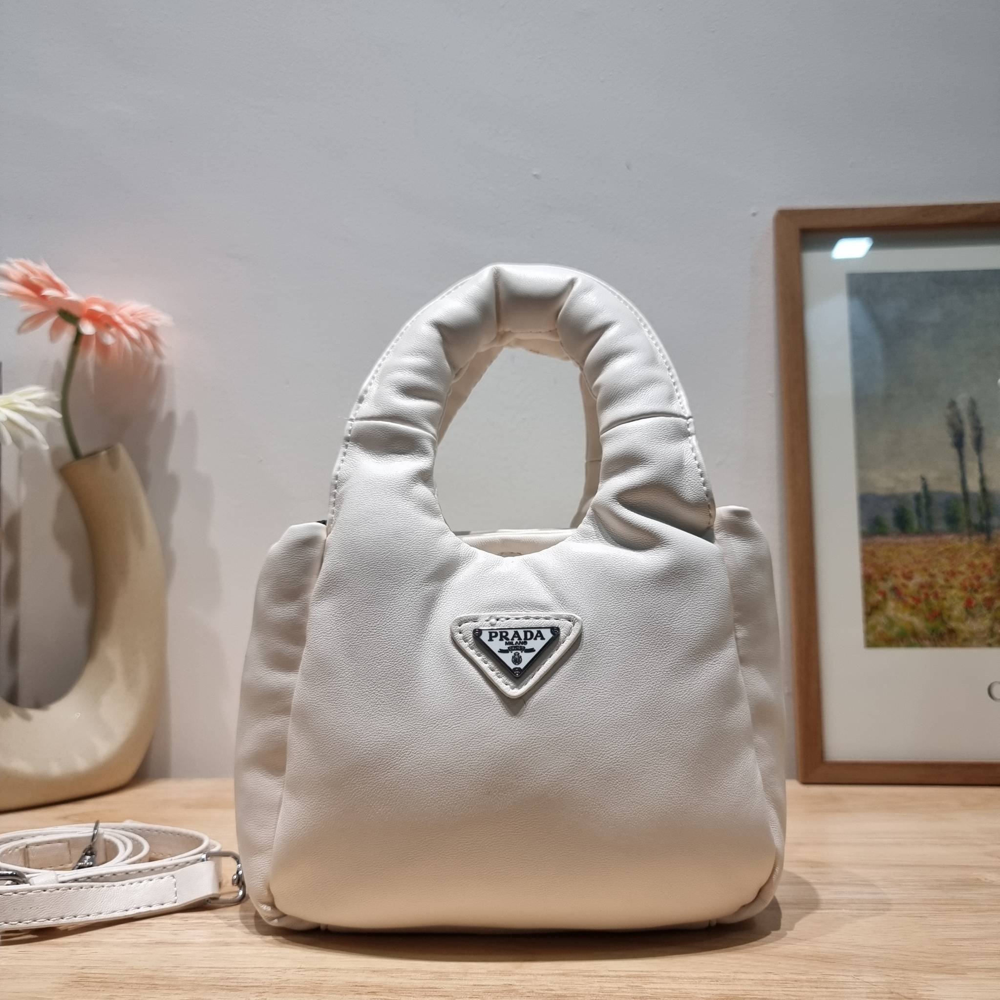 PRADA Small padded Soft nappa-leather bag พร้อมส่ง 4 สี น้องใหม่ล่าสุด กับคอลเลคชั่นที่ทำออกมาตอบโจทย์ได้ทุกไลฟ์สไตล์