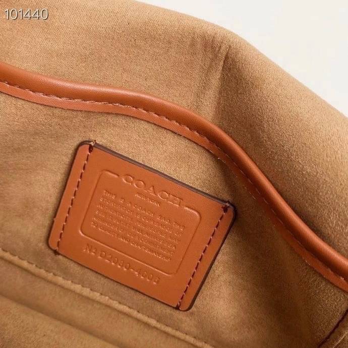 Coach Tabby Shoulder Bag 26 Polished pebble leather, suede and refined calf leather Inside zip and multifunction pockets