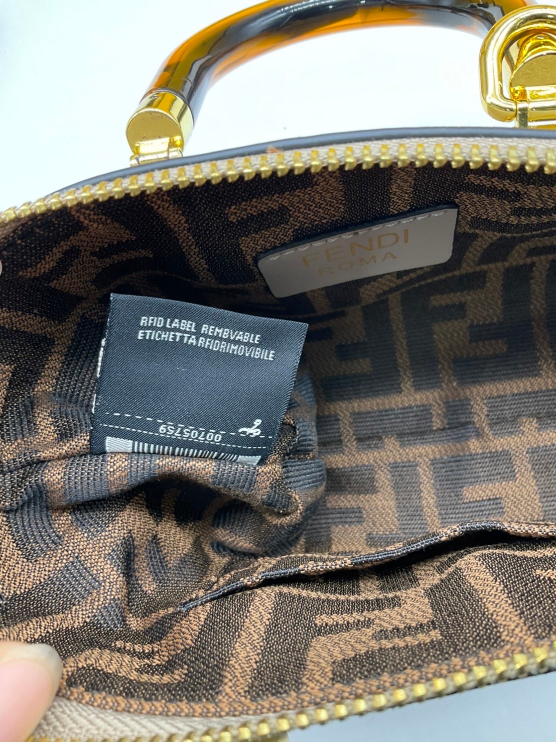 FENDI By The Way Mini Bag พร้อมส่งที่ไทย ภาพถ่ายจากงานขายจริง Iconic mini By The Way Boston bag made FENDI ROMA lettering and rigid tortoiseshell-effect plexiglass handles.