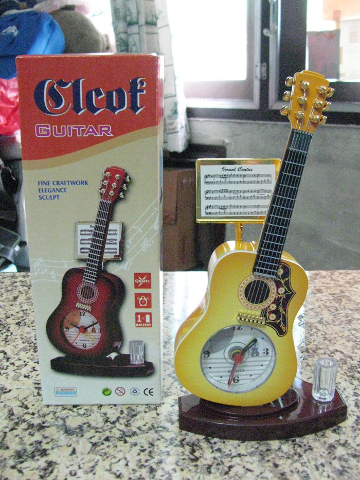 สินค้าหมดค่ะ นาฬิกาปลุกกีต้าร์สีเหลืองค่ะ