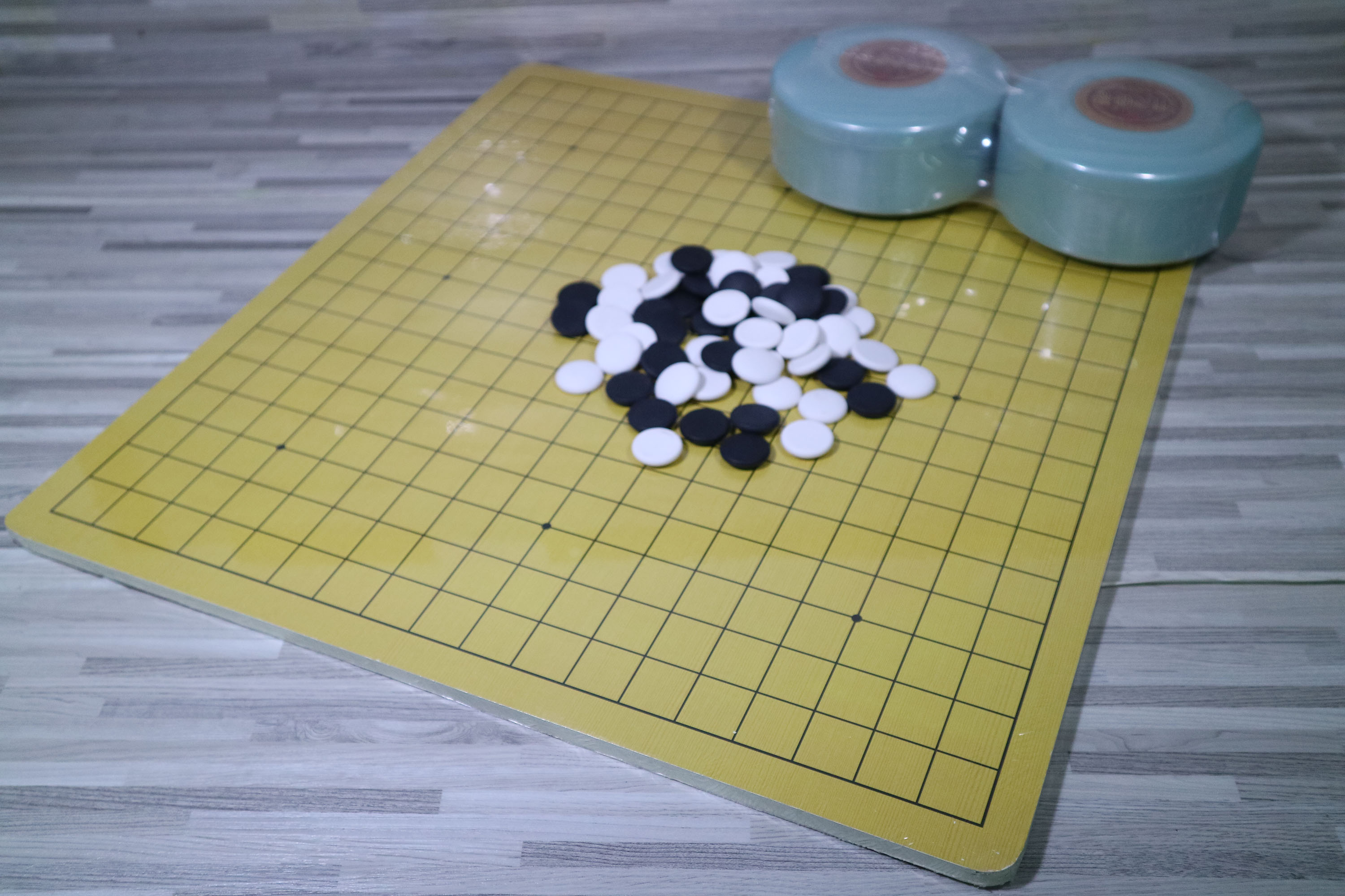 ชุดหมากล้อมเม็็ดเซรามิคพร้อมกระดานหนา0.8ซม(19เส้นและ13เส้น)