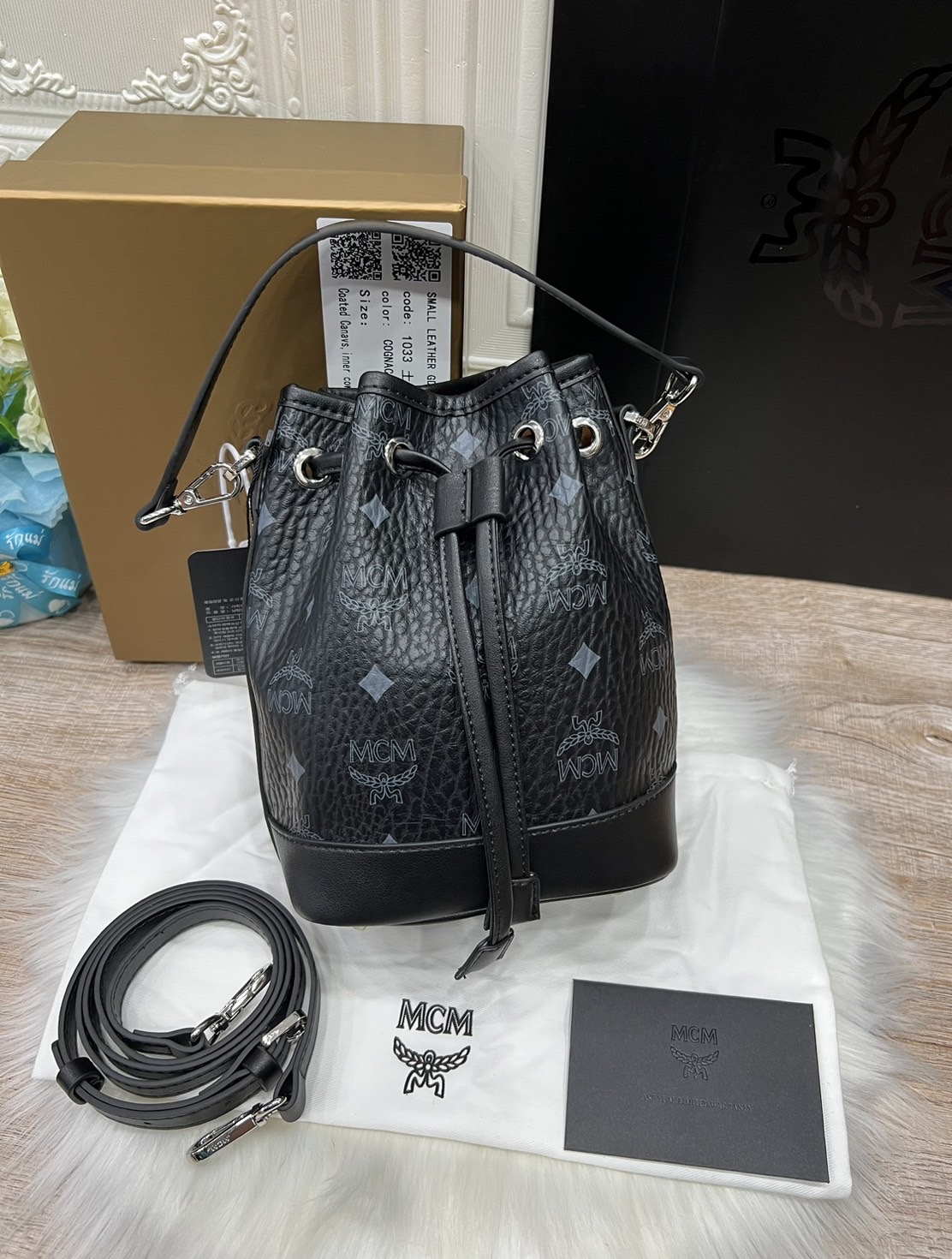 M.C.M MINI DESSAU DRAWSTRING BAG IN VISETOS กระเป๋าสะพายทรง bucket ไซส์ mini เกรดออริ สลับแท้ 1:1 ใช้งานต่างประเทศได้