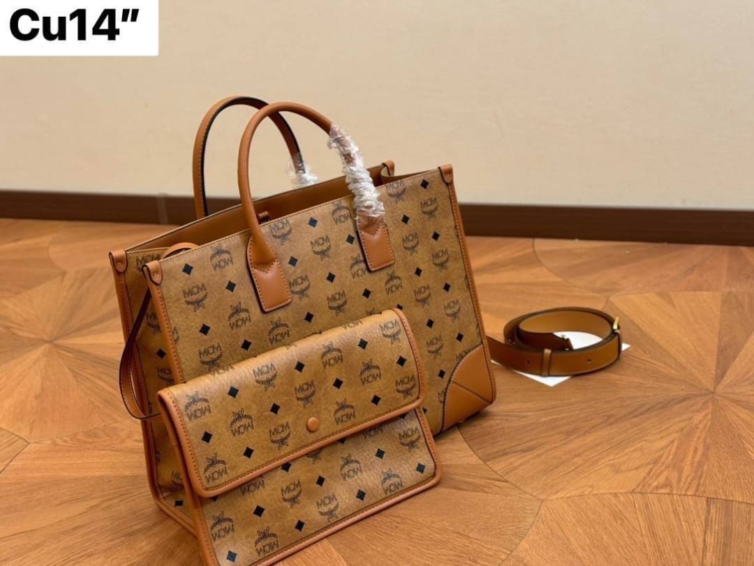 ORI | M.C.M MEDIUM MÜNCHEN TOTE IN VISETOS กระเป๋าโท้ทไซส์กลางจุได้เยอะ ใหม่ล่าสุด ใช้ได้ทั้งหนุ่มๆและสาวๆ รูปทรงคลาสสิค ดีไซน์เป็นเอกลักษณ์ แถมยังได้ใบลูกใส่ของจุกจิกได้อีก