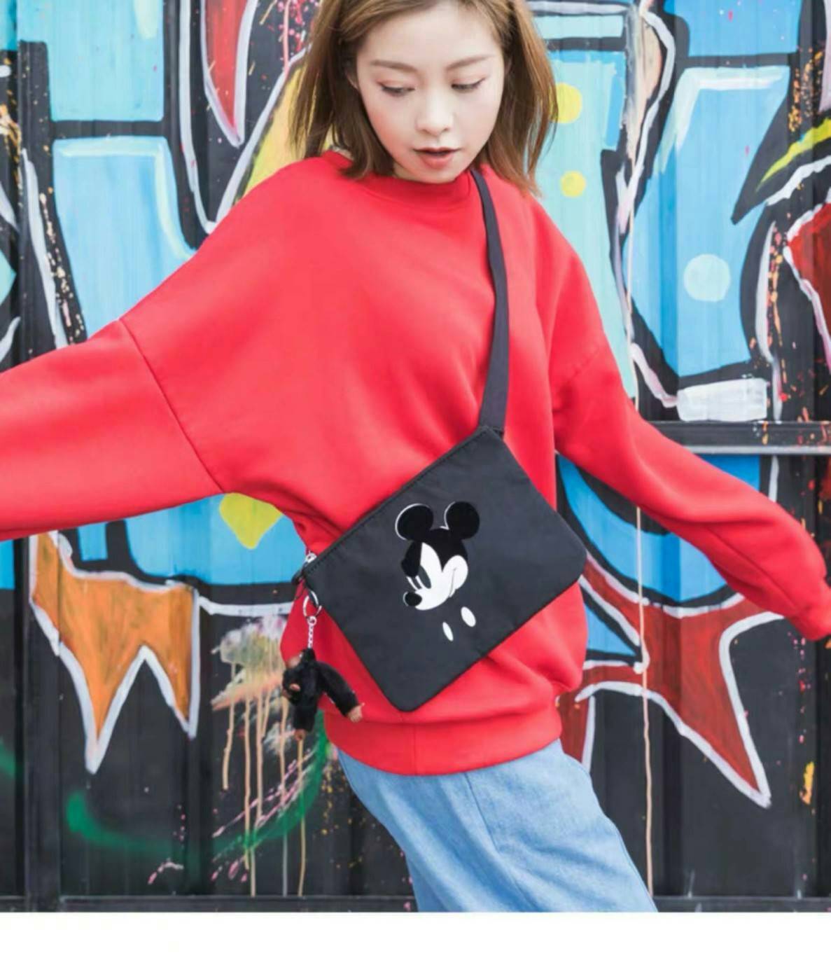 Kipling MAY Small 2-in-1 Pouch and Crossbody กระเป๋าสะพายหรือคาดเอว ขนาดมินิรุ่น Limited ทรงน่ารัก น้ำหนักเบา ใช้ได้ทั้งสองด้าน ด้านหน้ามีสกรีน mickey mouse ด้านหลังประดับโลโก้ มาพร้อมพวงกุญแจแบรนด์ เปิดปิดด้วยซิปสะดวกใช้ หัวซิปแบรนด์ มีหนึ่งช่องซิป และสา