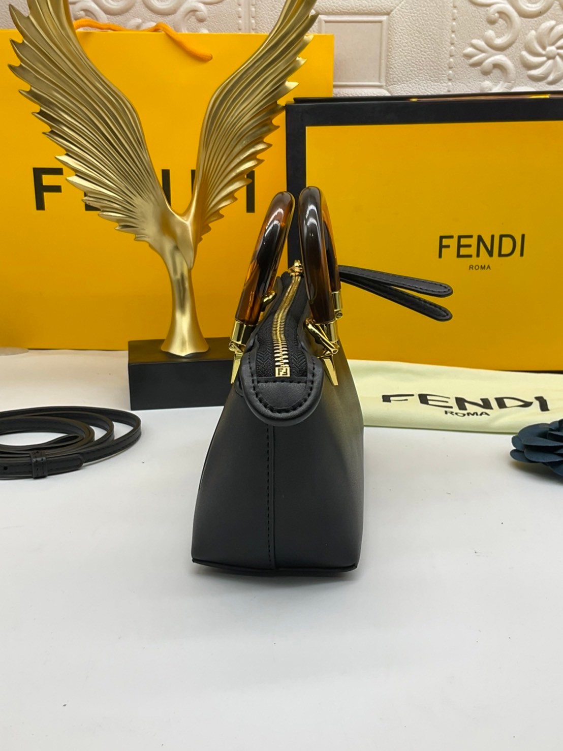 FENDI By The Way Mini Bag พร้อมส่งที่ไทย ภาพถ่ายจากงานขายจริง Iconic mini By The Way Boston bag made FENDI ROMA lettering and rigid tortoiseshell-effect plexiglass handles.