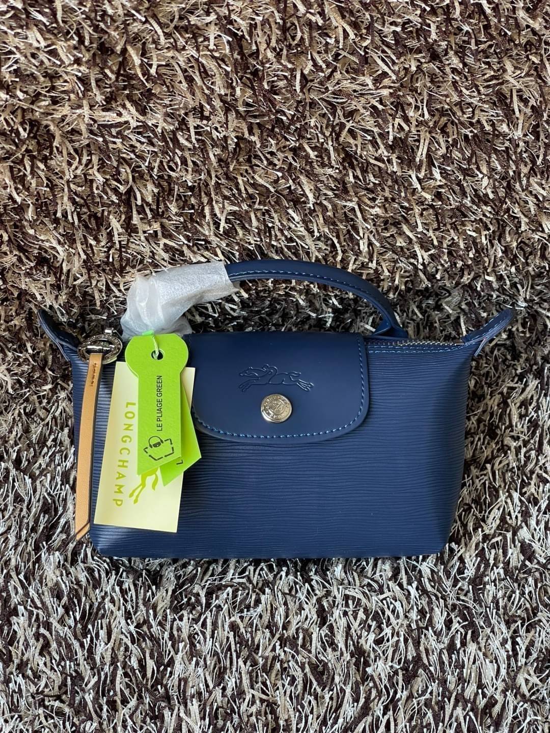 LONGCHAMP LE PLIAGE CITY POUCH WITH HANDLE Taupe - Canvas (ไม่มีสายยาว) กระเป๋าเครื่องสำอางแบบมีซิปพร้อมหูหิ้วใบนี้เหมาะสำหรับการจัดระเบียบกระเป๋าของคุณ