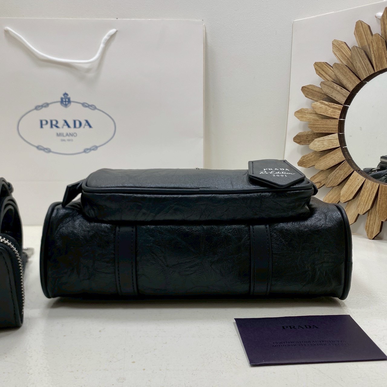 ORI หนังแท้ | Prada Antique nappa leather multi-pocket top-handle bag กระเป๋าสะพายทรง keepall มีช่องซิปด้านหน้าพร้อมหูจับ งานหนังยับดีไซน์เอฟเฟกต์เท็กซ์เจอร์ที่มีเสน่ห์สไตล์วินเทจ