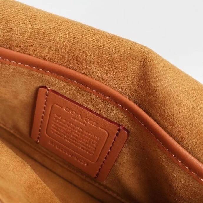 Coach Tabby Shoulder Bag 26 Polished pebble leather, suede and refined calf leather Inside zip and multifunction pockets