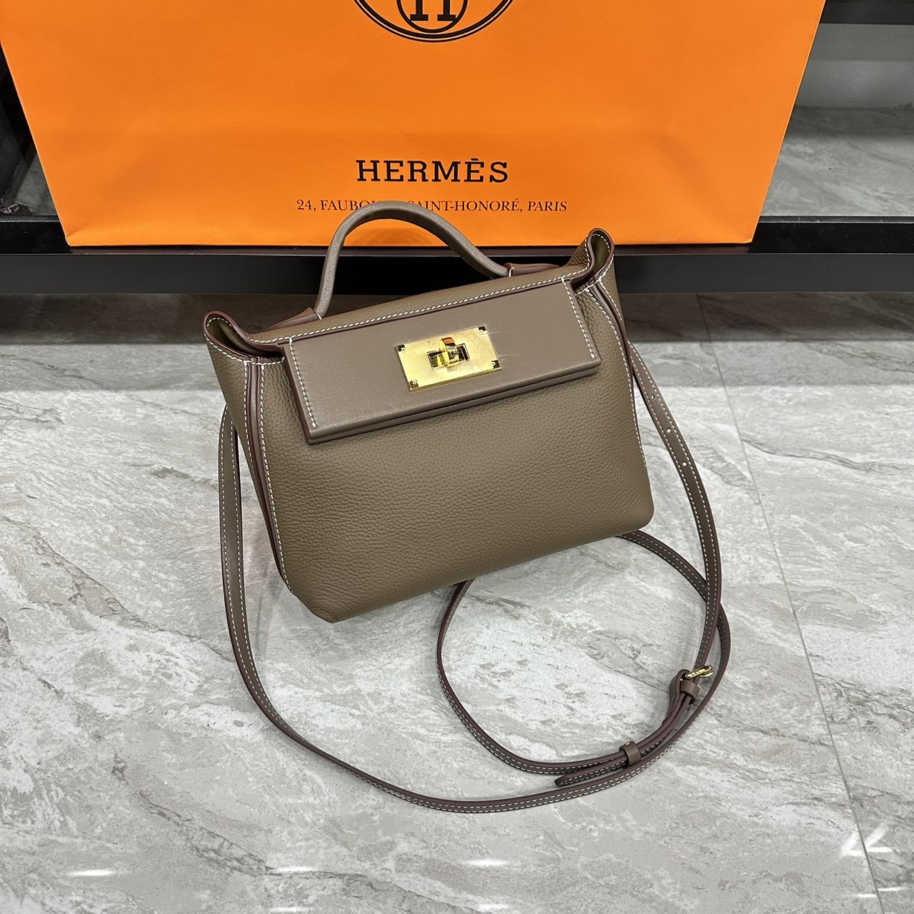HERMES Hermes 24/24 Mini bag 20cm กระเป๋าถือ/สะพายแบรนด์หรู เอกลักษณ์ของความสง่างาม เกรดออริ สลับแท้ 1:1 ใช้งานต่างประเทศได้