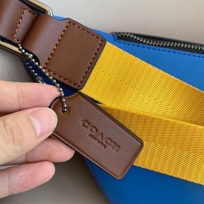 OUTTLET 】COACH RIVINGTON BELT BAG IN COLORBLOCK SIGNATURE CANVAS WITH COACH PATCH (962) รุ่นใบใหญ่จุใจ ใช้ได้ทั้งชายหญิง