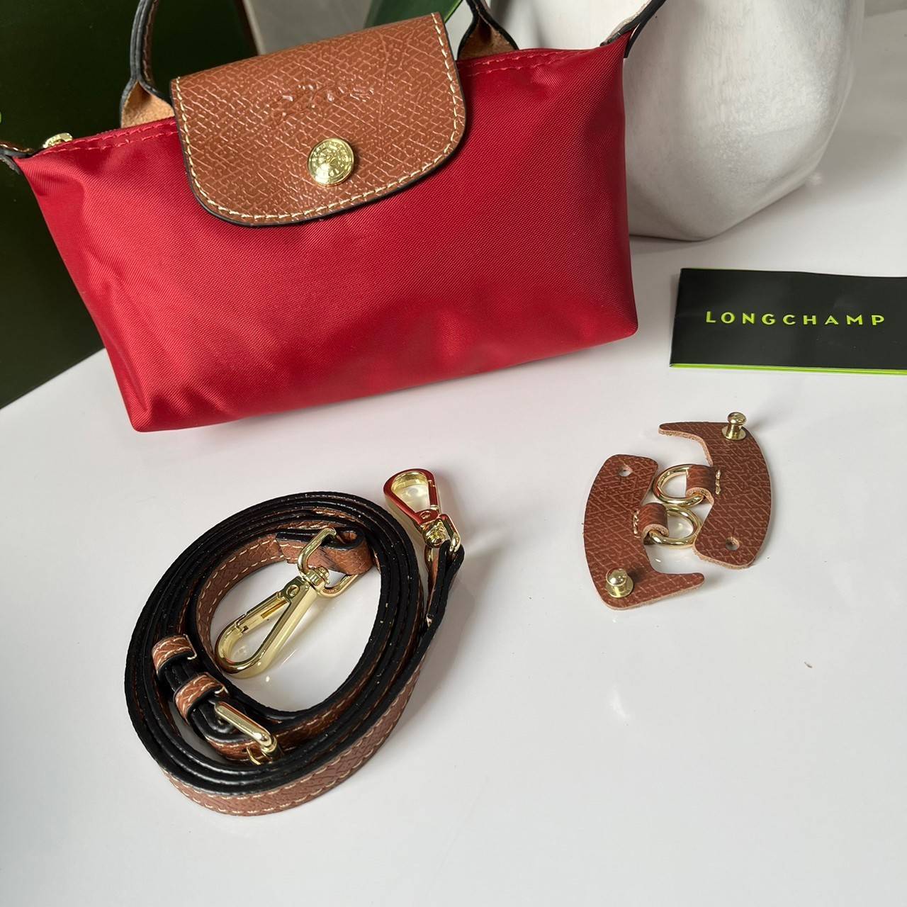 LONGCHAMP LE PLIAGE ORIGINAL Pouch with handle กระเป๋าใบเล็กขนาดกระทัดเหมาะกับใส่ของจำเป็นจุกจิก กันน้ำได้ พร้อมส่ง