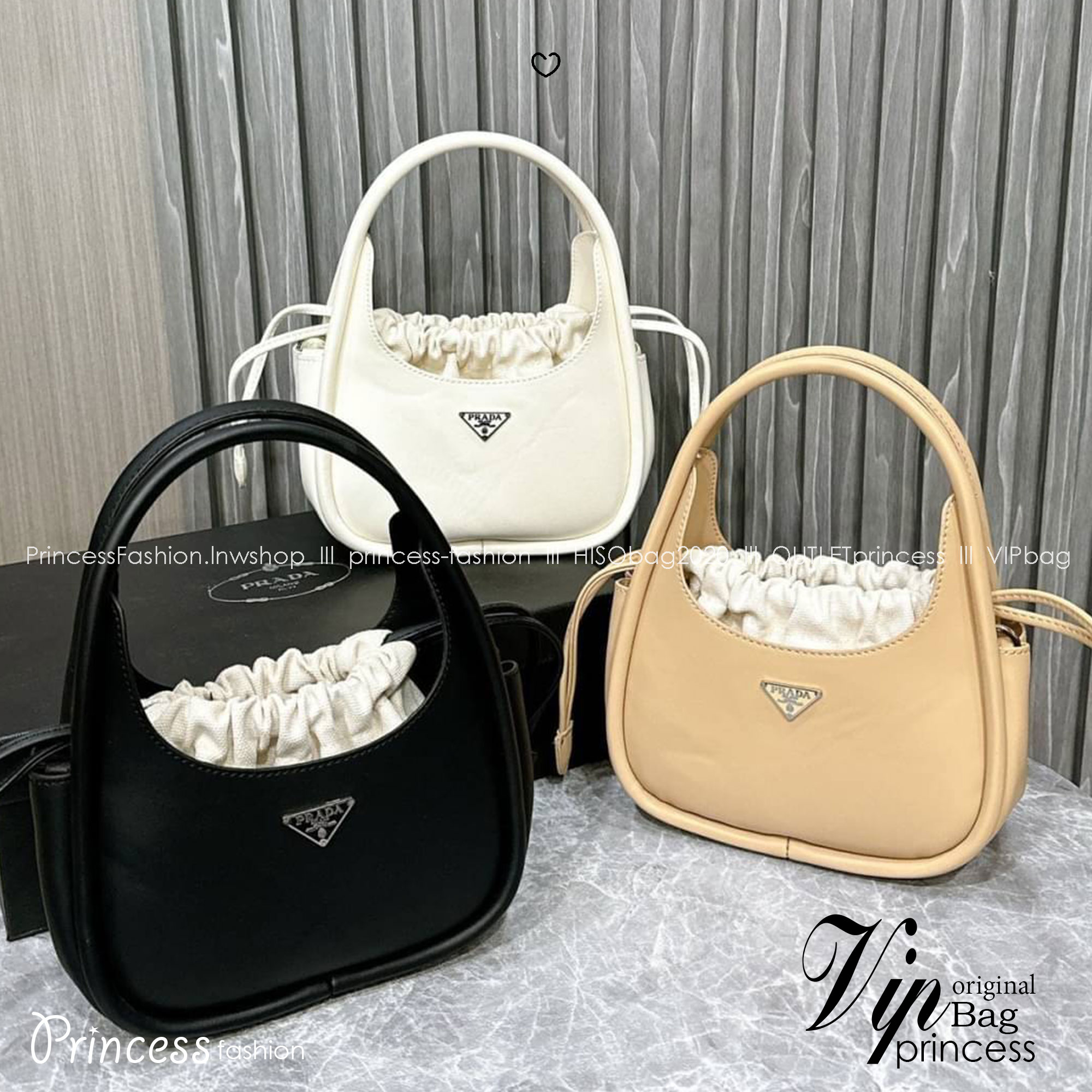 PRADA leather handbag กระเป๋าถือดีไซน์สวย ใช้งานง่าย มีกระเป๋าผ้าเชือกผูกเพิ่มกิมมิกได้อย่างลงตัวน่ารัก มาพร้อมสายสะพายยาวถอดได้ ปรับใช้ได้กับทุกลุคและแมทช์กับทุกสไตล์ แนะนำเลยจ้า