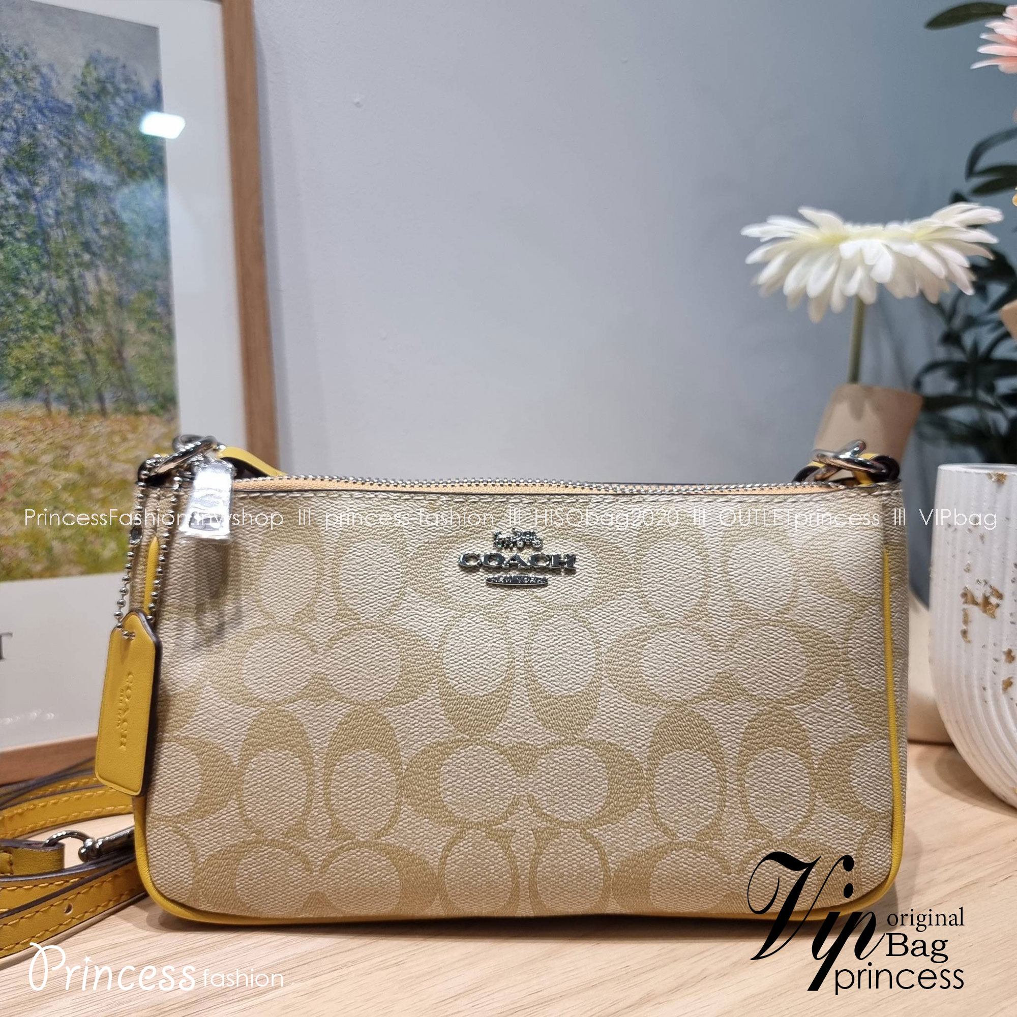 COACH TOP HANDLE POUCH F58321 พร้อมส่ง 9 สี กระเป๋าทรงพอช ยอดฮิต ยกขึ้นแท่น ด้วยดีไซน์ที่ออกมาให้ใช้งานได้ง่าย ขนาดกำลังเหมาะ