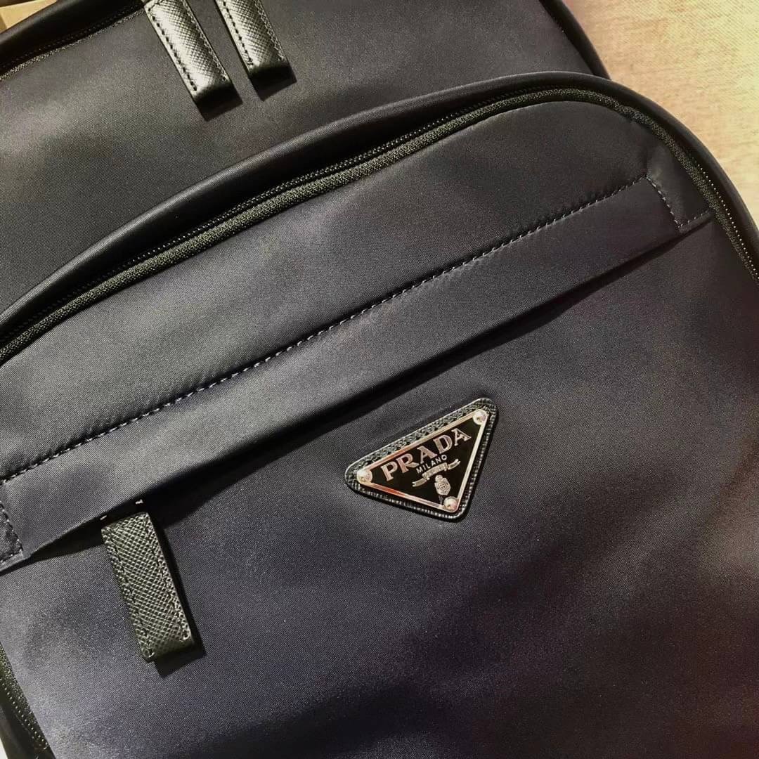 Prada Re-Nylon logo-plaque backpack / PRADA backpack พร้อมส่งที่ไทย กระเป๋าเป้ไนล่อนพราด้า **สินค้าเกรดท็อปออริจินอล 1:1 สลับแท้ ใช้งานต่างประเทศได้