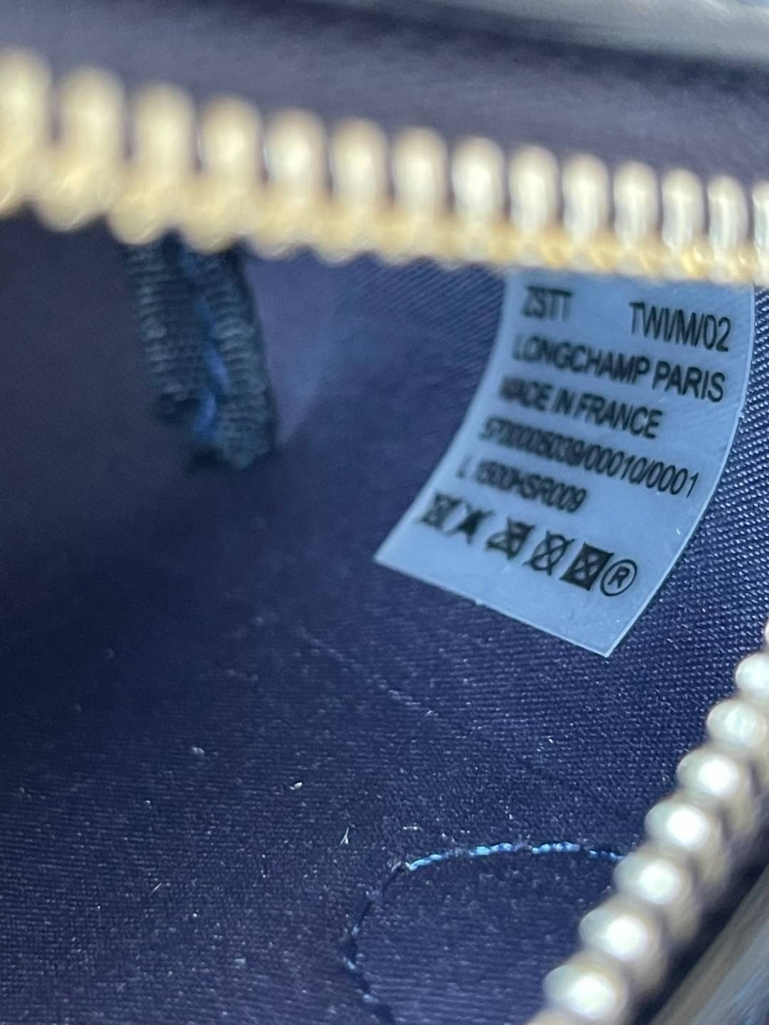 LONGCHAMP LE PLIAGE CITY POUCH WITH HANDLE Taupe - Canvas (ไม่มีสายยาว) กระเป๋าเครื่องสำอางแบบมีซิปพร้อมหูหิ้วใบนี้เหมาะสำหรับการจัดระเบียบกระเป๋าของคุณ