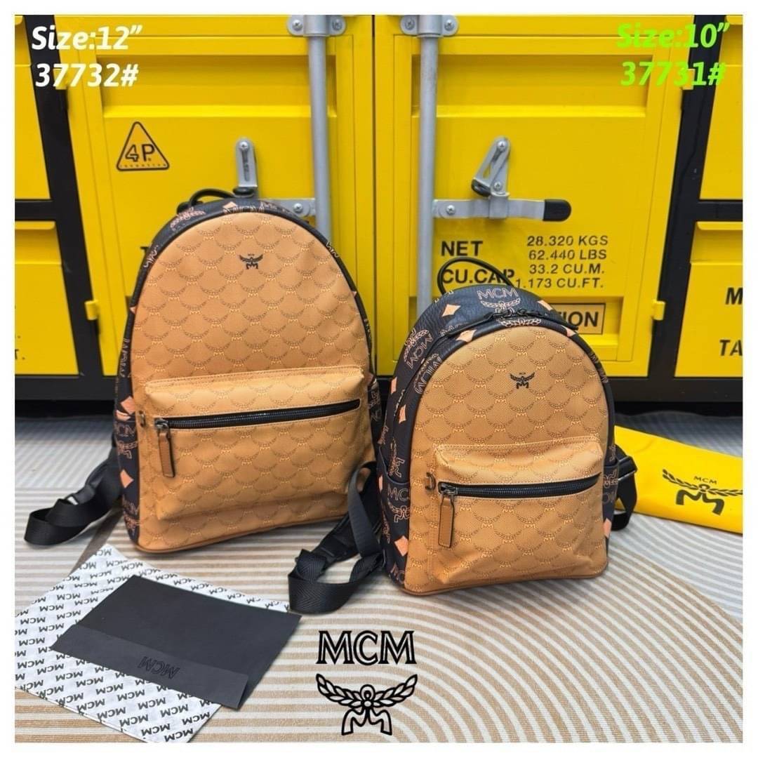 ORI | M.C.M Stark Backpack in Monogram Mix กระเป๋าเป้แมกซี่คอลใหม่ โดดเด่นด้วยดีไซน์สีดำด้านข้างและสายกระเป๋าตัดสีกันได้อย่างลงตัว Best seller Unisex ของงานเป้จริงๆ